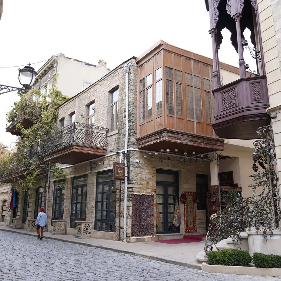 Traditional architecture and cobblestone street in the historic Old City of Baku, Azerbaijan