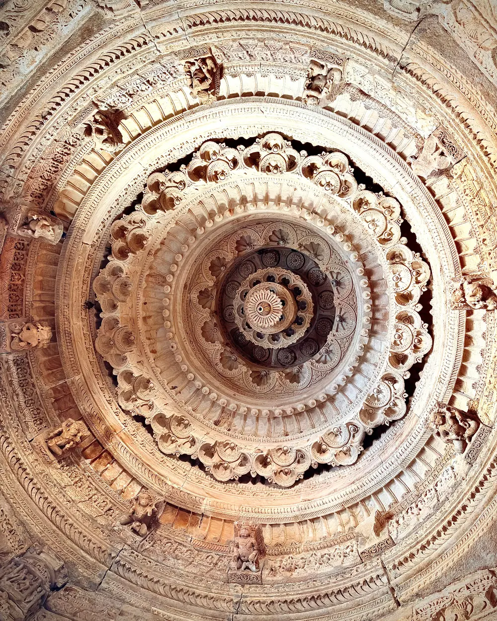Detailed view of the exquisite stone ceiling at Sun Temple, Modhera, showcasing intricate carvings and remarkable architecture