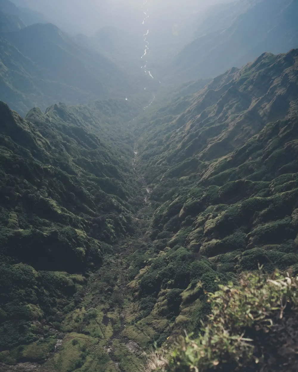 Ethereal view of lush green valleys and mountains in Mahabaleshwar, India